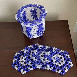 Utensil holder and 4 pc coaster set.